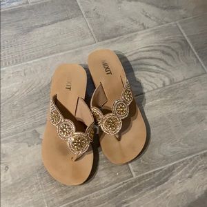 Flip flops with small heel.